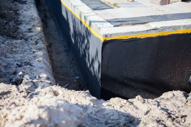 Professional Waterproofing technician working in Granger, WA
